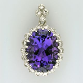 amethyst and round cut diamond pendant in 14k white gold
