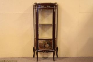 French curved glass curio cabinet or vitrine is mahogany with