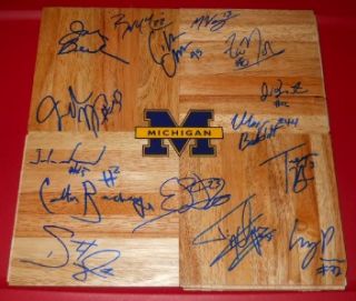 You are bidding on a 6x6 parquet floorboard autographed by former NBA