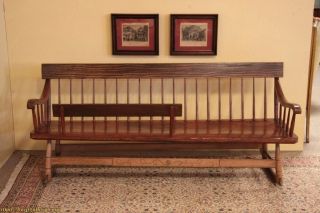 this rocking deacon s bench with a fence to cradle a baby was