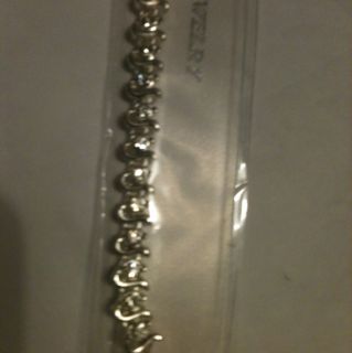 White Gold Bracelet with Dimond Studs Retails at 80 00$