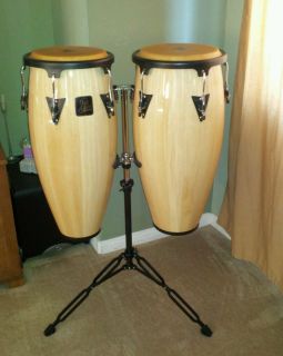Brand new L P congas with stand 10in 11in drums in unopen box