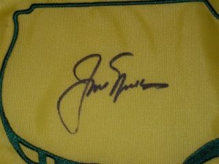 Signature is hand signed on an official PGA 2011 Masters flag. Please