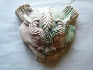 Eduardo Paolozzi dragon mask with pink green wash cast plaster