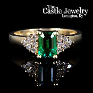 Emerald Cut Emerald and Diamond Ring.  12 Diamonds .25 CTTW   14k