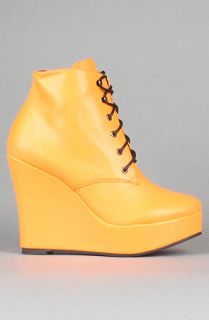 Ego and Greed The Poland Boot in Neon Orange