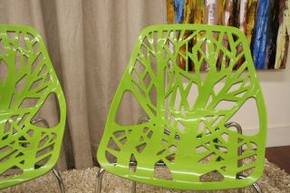 this forest chair lends a modern touch of the beauty of a small grove