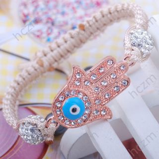 white crystal pave ball rose gold tone hand evil eye beige cord string