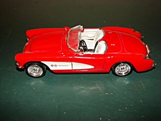 Red 1957 Corvette with Opening Doors Hood Damaged Windshield Frame