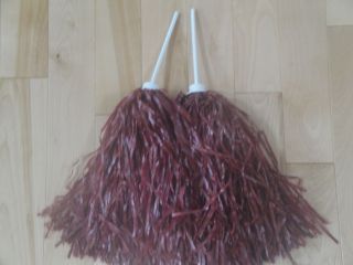 pair of maroon rooter pom poms arizona cardinals colors time