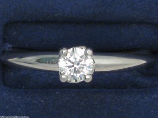 Hearts on Fire Platinum Insignia 4 Engagement Ringwith Center Stone
