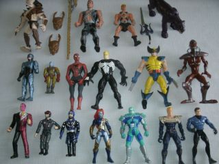17 action figures Spiderman, Joker, Heman, Predator, Robocop