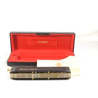 this is a previously owned hohner 7584 super 64x chromatic harmonica i