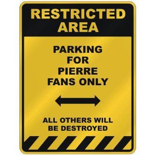 RESTRICTED AREA  PARKING FOR PIERRE FANS ONLY  PARKING
