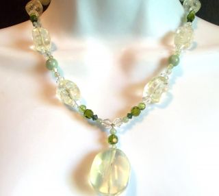  is this gorgeous Sterling Signed,Vintage Rock Crystal & Jade Necklace