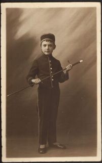 Joung boy with walking stick antique real cabinet photo  