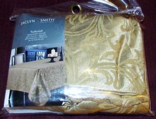 Jaclyn Smith 70 inch Round Fabric Tablecloth Dark Golden Beige