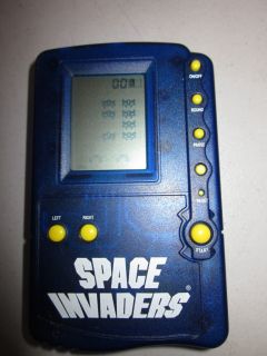 MGA Entertainment Space Invaders Electronic Handheld Travel Game 1997