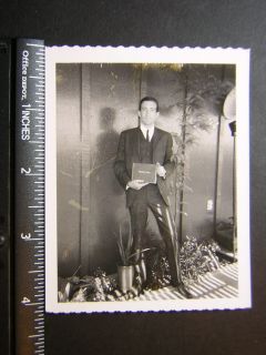 Vintage B&W Polaroid 1257 tall slender man in suit stands w Graduation