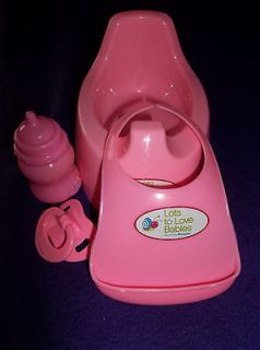 LOTS TO LOVE BABIES POTTY CHAIR, PACIFER,BOTTLE AND BIB