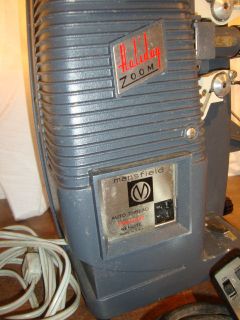 VINTAGE MANSFIELD HOLIDAY ZOOM 8MM PROJECTOR,REMOTE CONTROL WITH