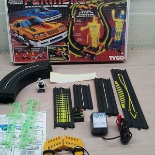 vintage toys,electric racing set transformers by tyco