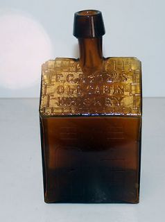 AMBER GLASS MOLD BLOWN E.C. BOOZS OLD CABIN WHISKEY FIGURAL BOTTLE