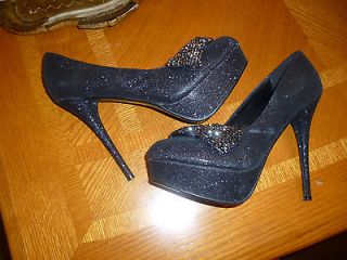 Hidden Platform Black glitter shoes w a jeweled bow IB sz 10