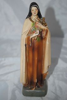 Vintage 40s chalk statue of Saint Theresa holding a cross and flowers