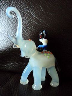 RARE OPALESCENT GLASS ELEPHANT WITH BLACKAMOOR MAHOUT