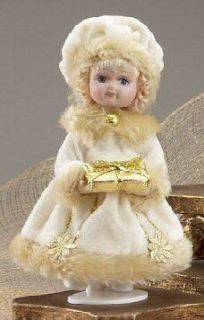 DELTON PORCELAIN 6 1/2 WINTER DOLL WITH PRESENT