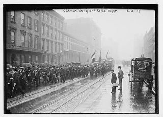 Photo German America n Rifle Team,in parade,New York,NY,umbrel las