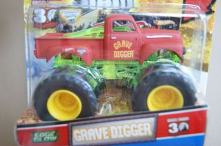 HOT WHEELS MONSTER JAM TRUCK GRAVE DIGGER EDGE GLOW Red Truck with