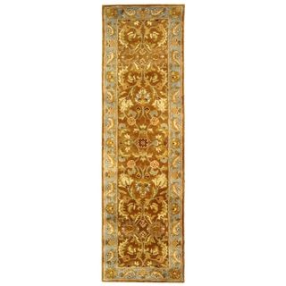 Handmade Heritage Shahi Brown/ Blue Wool Runner (23 X 8) (BrownPattern OrientalMeasures 0.625 inch thickTip We recommend the use of a non skid pad to keep the rug in place on smooth surfaces.All rug sizes are approximate. Due to the difference of monito
