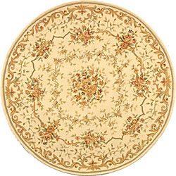 Handmade Paradise Bouquet Ivory Wool And Silk Rug (4 Round) (IvoryPattern FloralMeasures 0.5 inch thickTip We recommend the use of a non skid pad to keep the rug in place on smooth surfaces.All rug sizes are approximate. Due to the difference of monitor