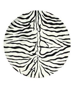 Hand tufted Zebra Stripe Wool Rug (8 Ft Round) (whitePattern AnimalMeasures 1 inch thickPrimary materials WoolLatex NoPile height 1 inchStyle ContemporaryPrimary color WhiteSecondary colors BlackPattern AnimalTip We recommend the use of a nonskid