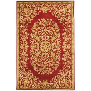 Handmade Heritage Red Wool Rug (4 X 6) (RedPattern OrientalMeasures 0.625 inch thickTip We recommend the use of a non skid pad to keep the rug in place on smooth surfaces.All rug sizes are approximate. Due to the difference of monitor colors, some rug c