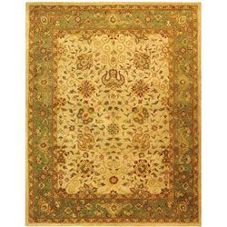 Handmade Antiquities Mashad Ivory/ Green Wool Rug (76 X 96) (IvoryPattern OrientalMeasures 0.625 inch thickTip We recommend the use of a non skid pad to keep the rug in place on smooth surfaces.All rug sizes are approximate. Due to the difference of mon