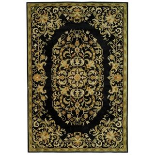 Handmade Heritage Black Wool Rug (6 X 9) (BlackPattern OrientalMeasures 0.625 inch thickTip We recommend the use of a non skid pad to keep the rug in place on smooth surfaces.All rug sizes are approximate. Due to the difference of monitor colors, some r