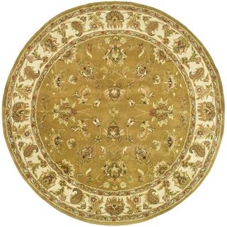 Handmade Heritage Tabriz Mocha/ Ivory Wool Rug (8 Round) (GoldPattern OrientalTip We recommend the use of a non skid pad to keep the rug in place on smooth surfaces.All rug sizes are approximate. Due to the difference of monitor colors, some rug colors 