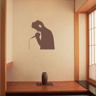 Man In Headphones With Microphone Brown Vinyl Wall Decal (Glossy brownEasy to apply; instructions includedDimensions 25 inches wide x 35 inches long )